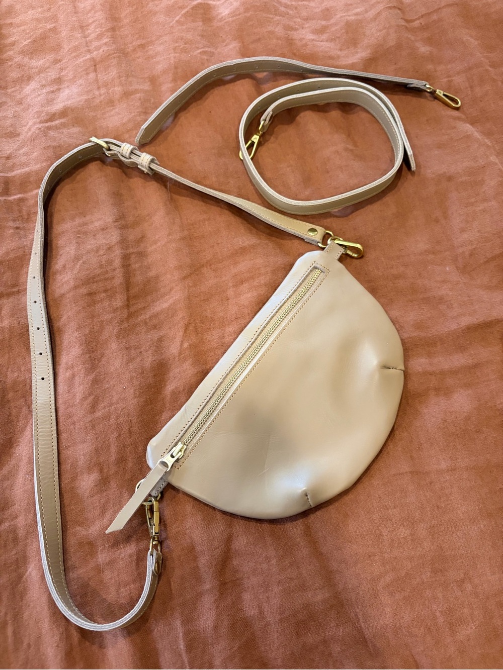 Tan Leather Crescent Crossbody sling bag with Gold Accents